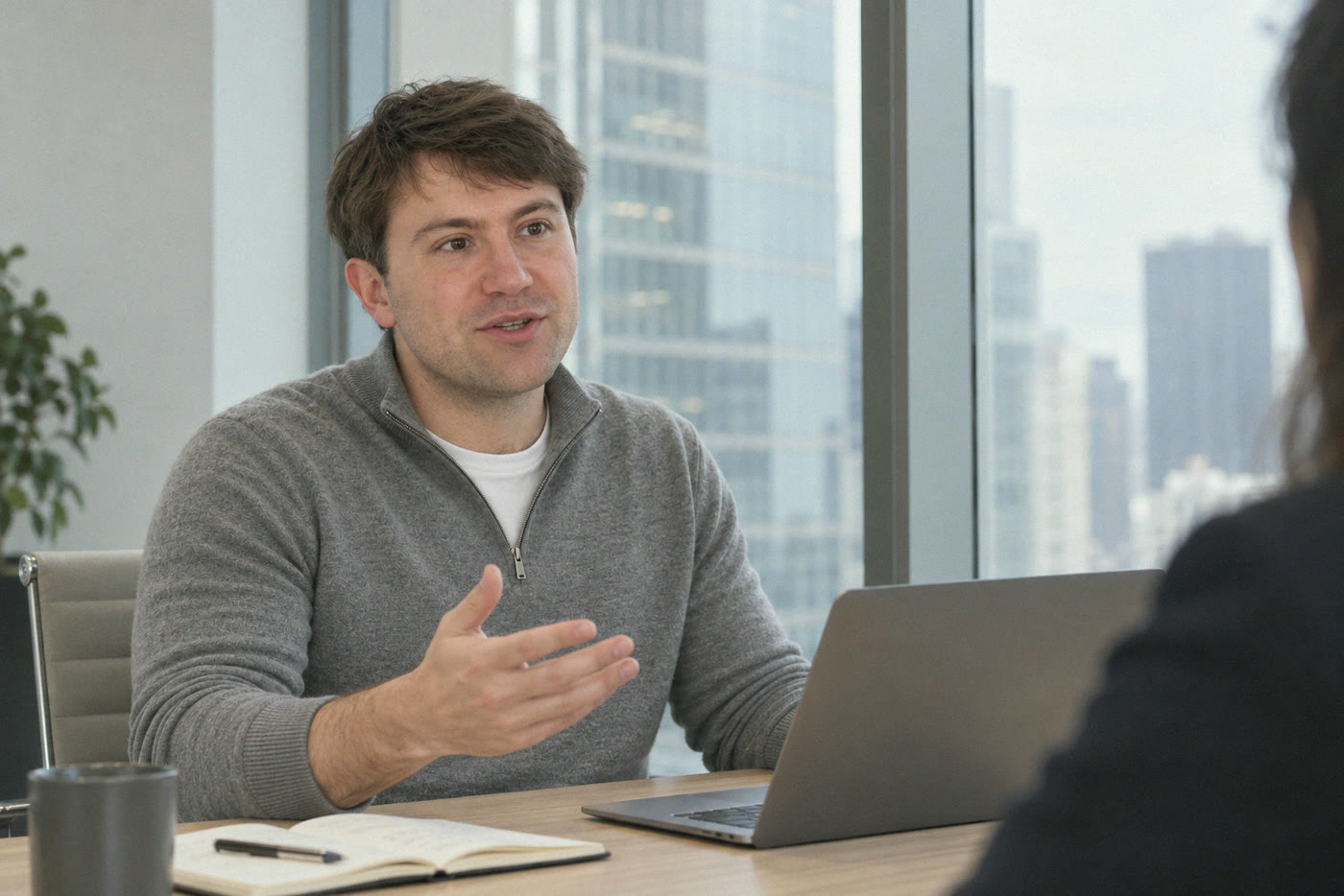 Johannes Janousek explaining a workflow in a meeting room in Central, Hong Kong